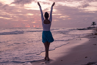 Women's white laced long-sleeved bodysuit.