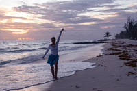 Women's white laced long-sleeved bodysuit.