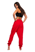 Red drop-crotch tracksuit pants for women, men, and kids.