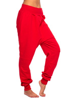 Red drop-crotch tracksuit pants for women, men, and kids.